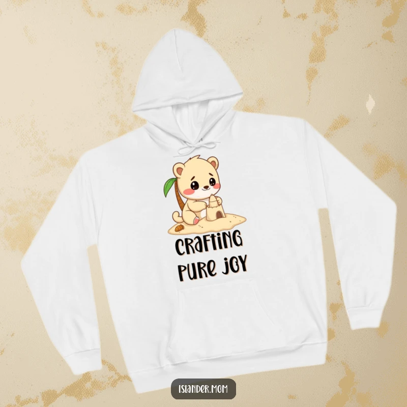 Funny hoodie with a kawaii islander animal deeply engrossed in building a delightful sandcastle, showing focused joy.