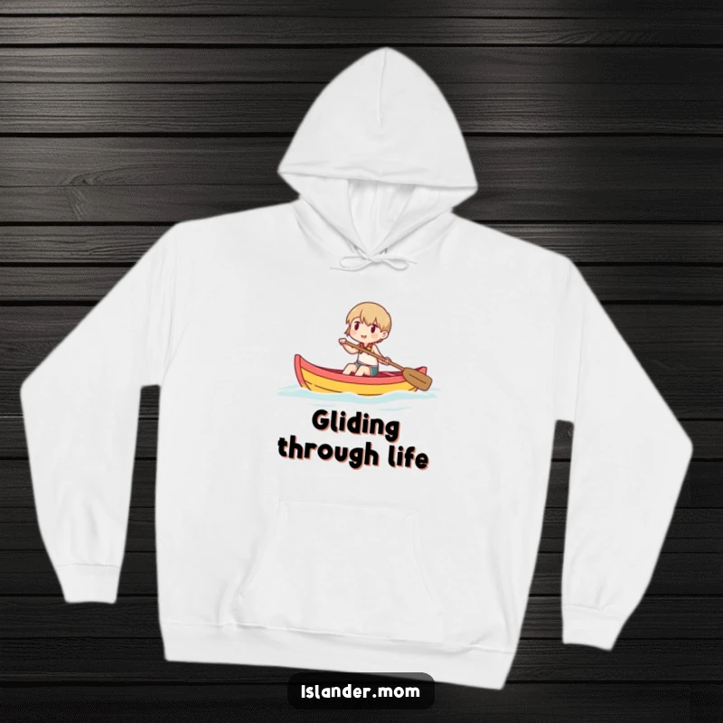 Funny hooded sweatshirt showing a character contentedly paddling a small, colorful canoe, radiating peaceful outdoor enjoyment.