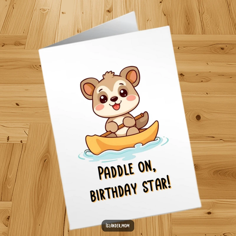 Funny Free Printable Birthday Card: A smiling animal paddles a canoe with joy, ready for a happy celebration.
